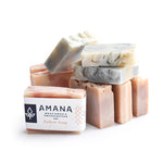Load image into Gallery viewer, Stack of various Amana Beef Tallow Soap bars on a white background
