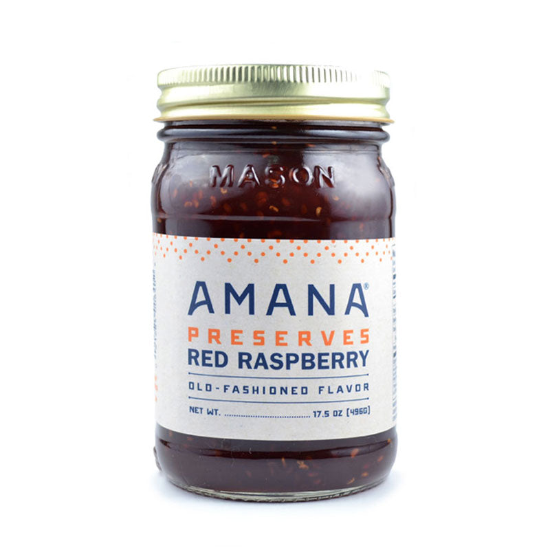 large jar of red raspberry preserves